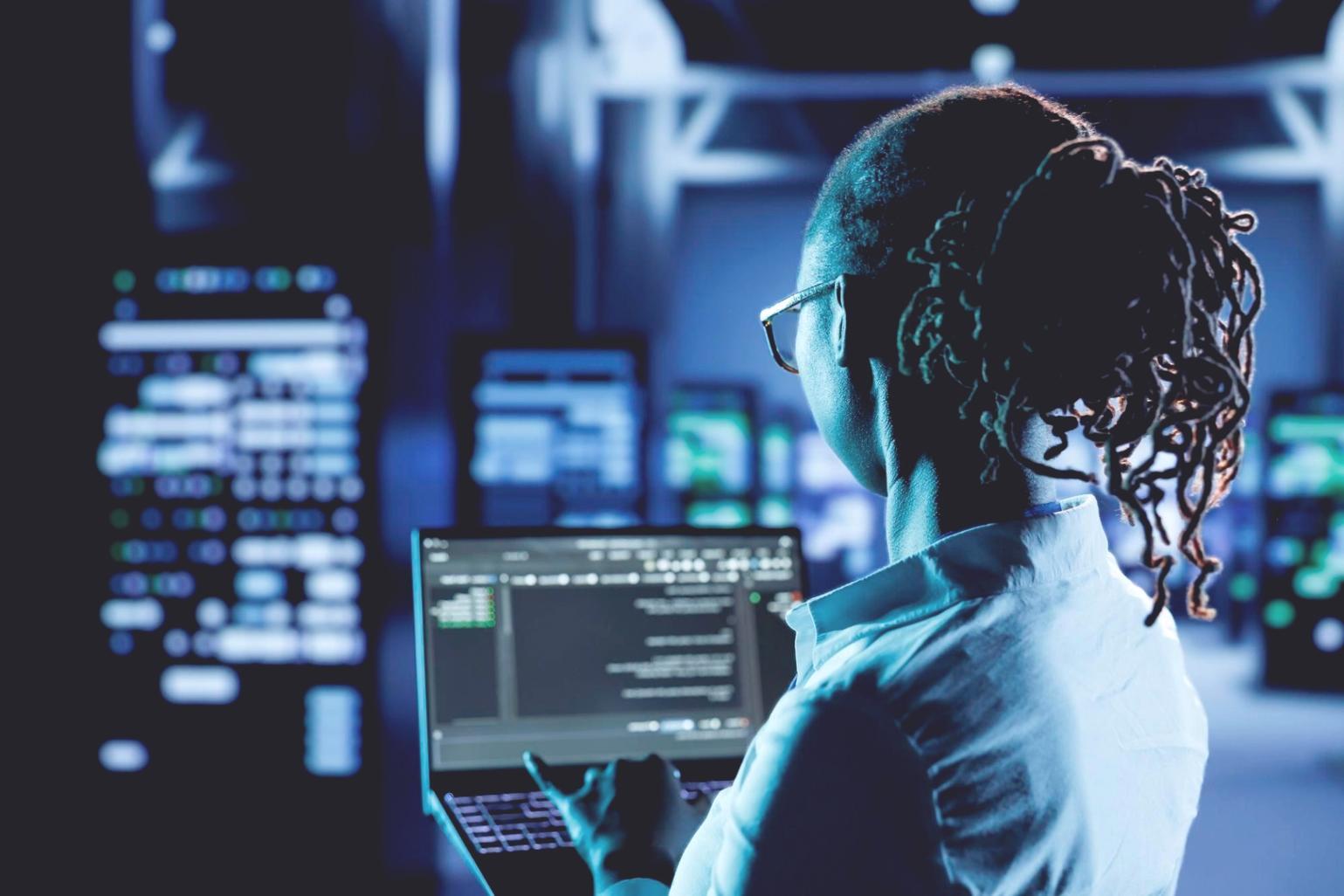 Students collaborating on blockchain governance project in modern learning environment